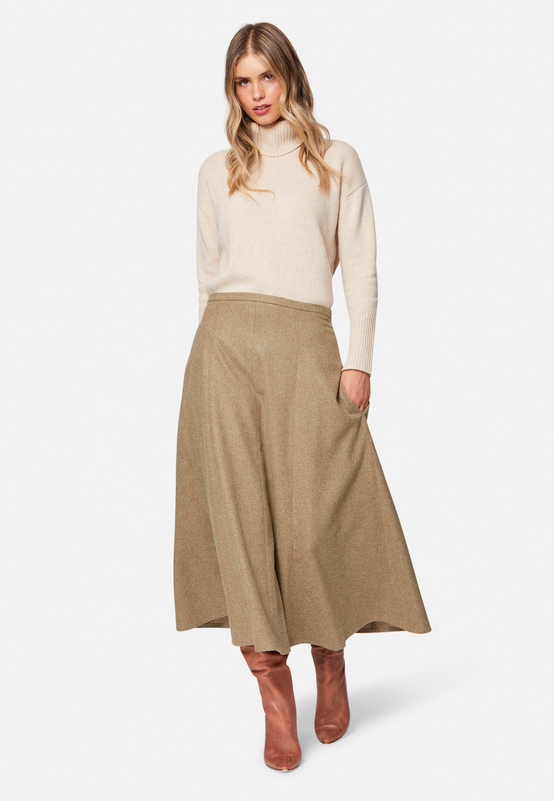 women wearing wool beige long skirt