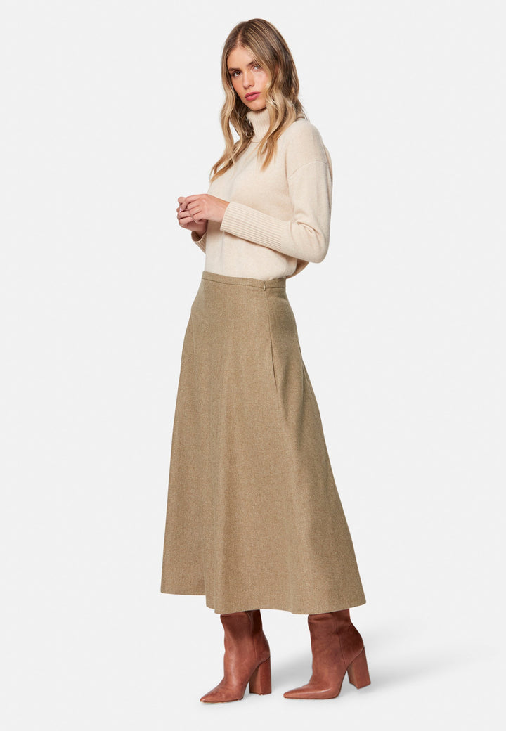 women wearing wool beige long skirt