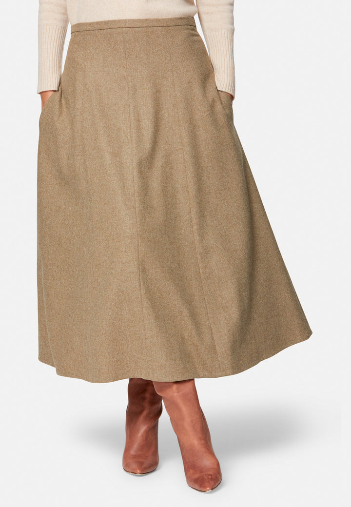 women wearing wool beige long skirt