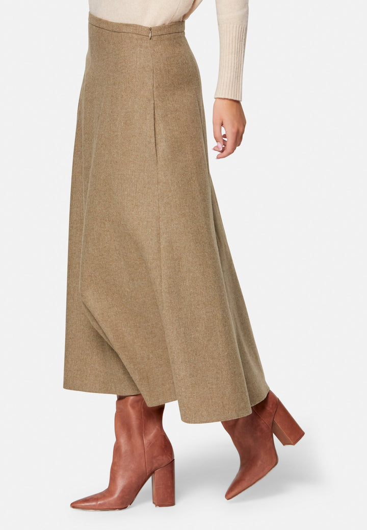 women wearing wool beige long skirt