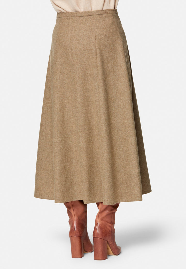 women wearing wool beige long skirt