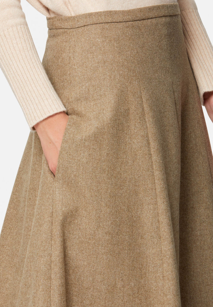 women wearing wool beige long skirt