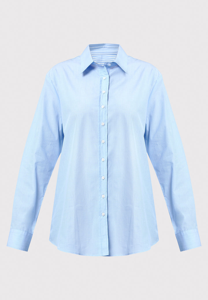 Light blue shirt on a light gray background