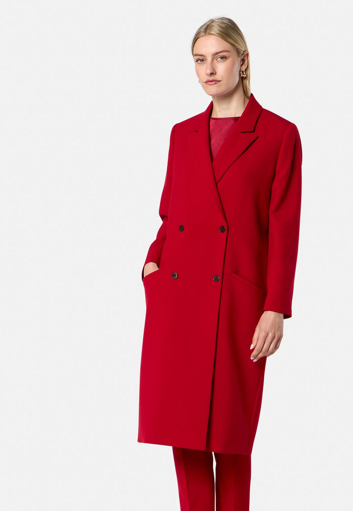 model wearing Victoria Ruby Red Coat