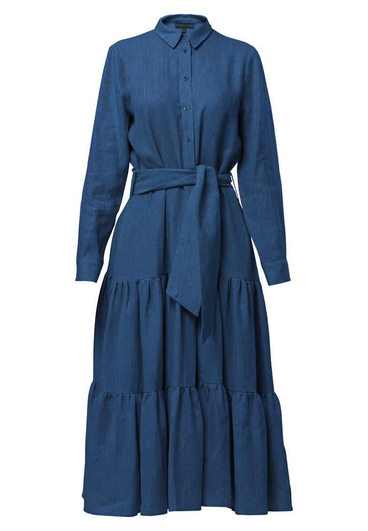 Adele Borage Blue Dress, crafted in a rich borage blue linen. The design showcases a classic shirt collar and a buttoned finish at the waist, ensuring a flattering silhouette that accentuates the hips. Transitioning seamlessly into a gathered tiered skirt, it exudes feminine charm. Complete with a detachable belt, practical pockets, and standard full-length shirt sleeves, this dress is versatile and perfect for any occasion.