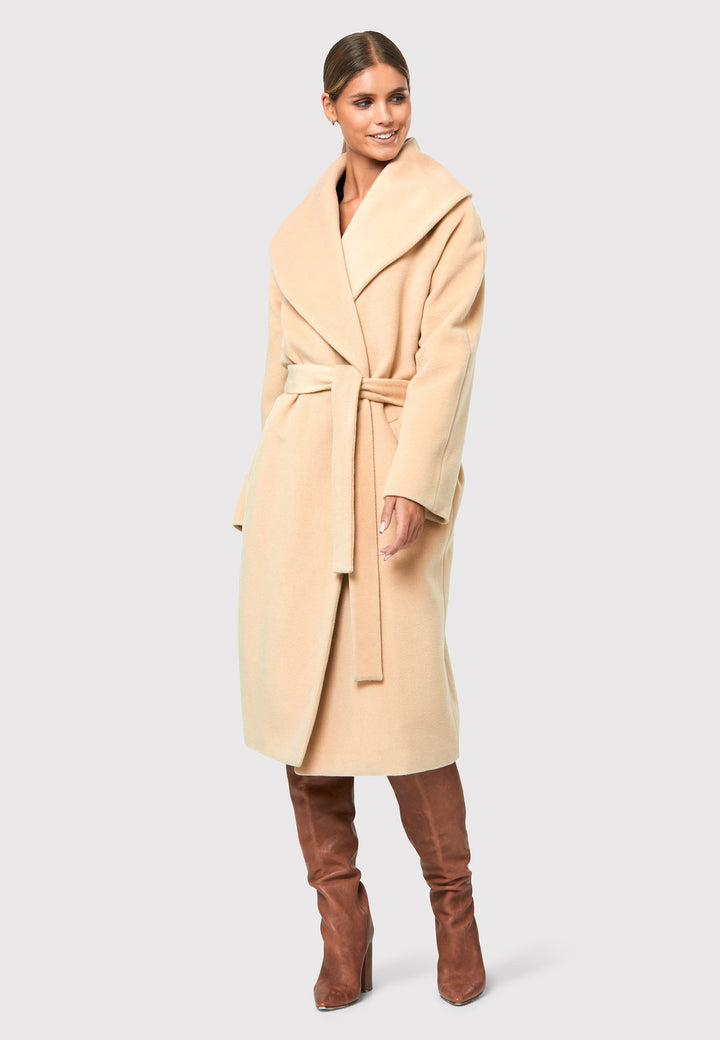  Ali Fawn Coat, a winter must-have. This exquisite coat features a timeless design with a shawl collar and raglan sleeves, adding a touch of sophistication to your outerwear 