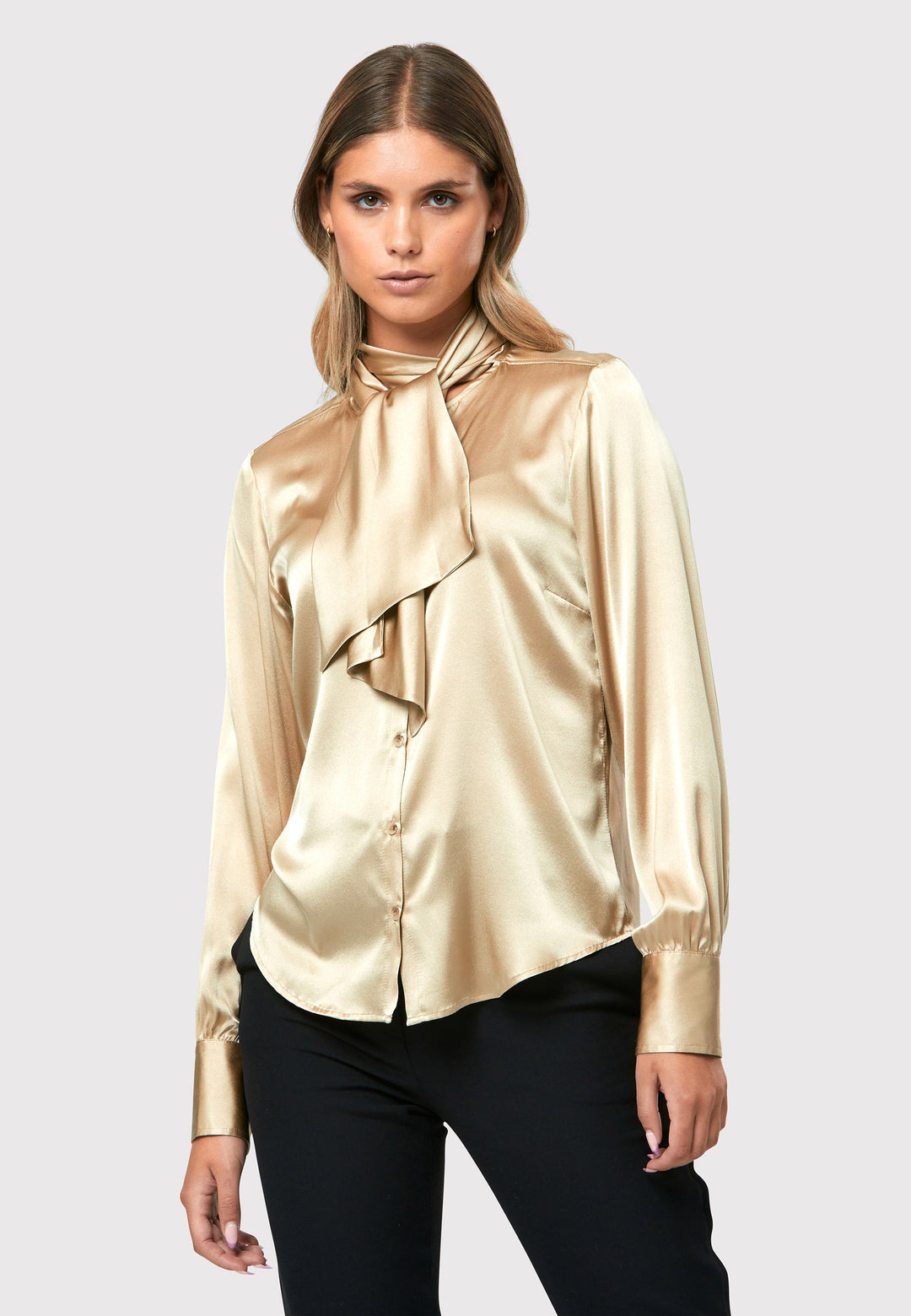  Crafted from a silk blend, it offers a luxurious feel against your skin. The button-down style pussy-bow neckline shirt.