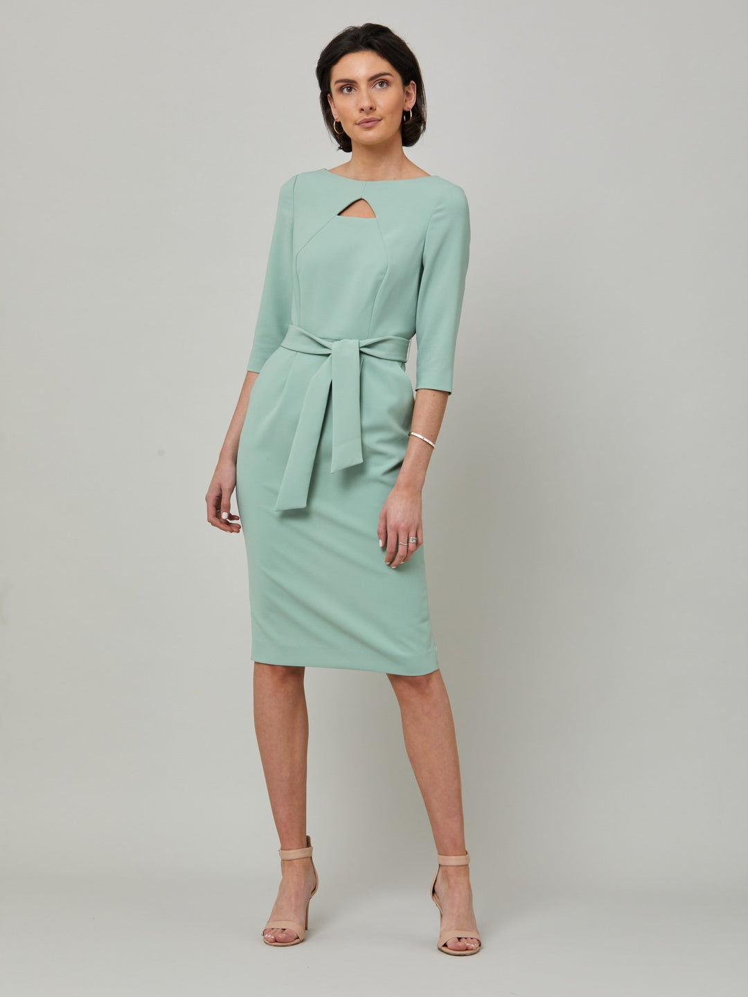 Beatrice is a fresh take on one of our key silhouettes. Features a statement diamond shape cut-out, belt and handy pockets. Crafted in our signature double crepe with a hint of stretch in willow green. Attending a summer wedding? Mother of the bride? Heading to the races? This is the dress for you.