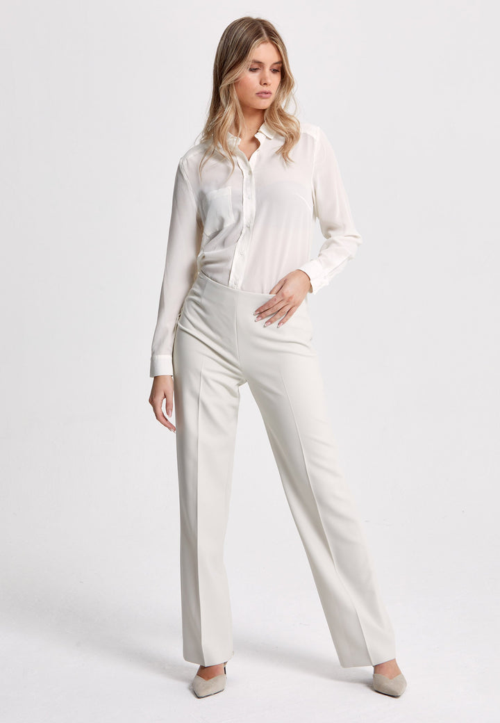 Investment-worthy, easy-fitting flat front pant. Relaxed straight leg crafted in a fluid tricotine. A wardrobe staple and HMcA classic. This fabric is made with a hint of elastane to ensure comfort and ease of movement. Shown here in a sophisticated neutral. Pair with a simple tee for workwear appeal or elevate your look with the coordinating blazer.
