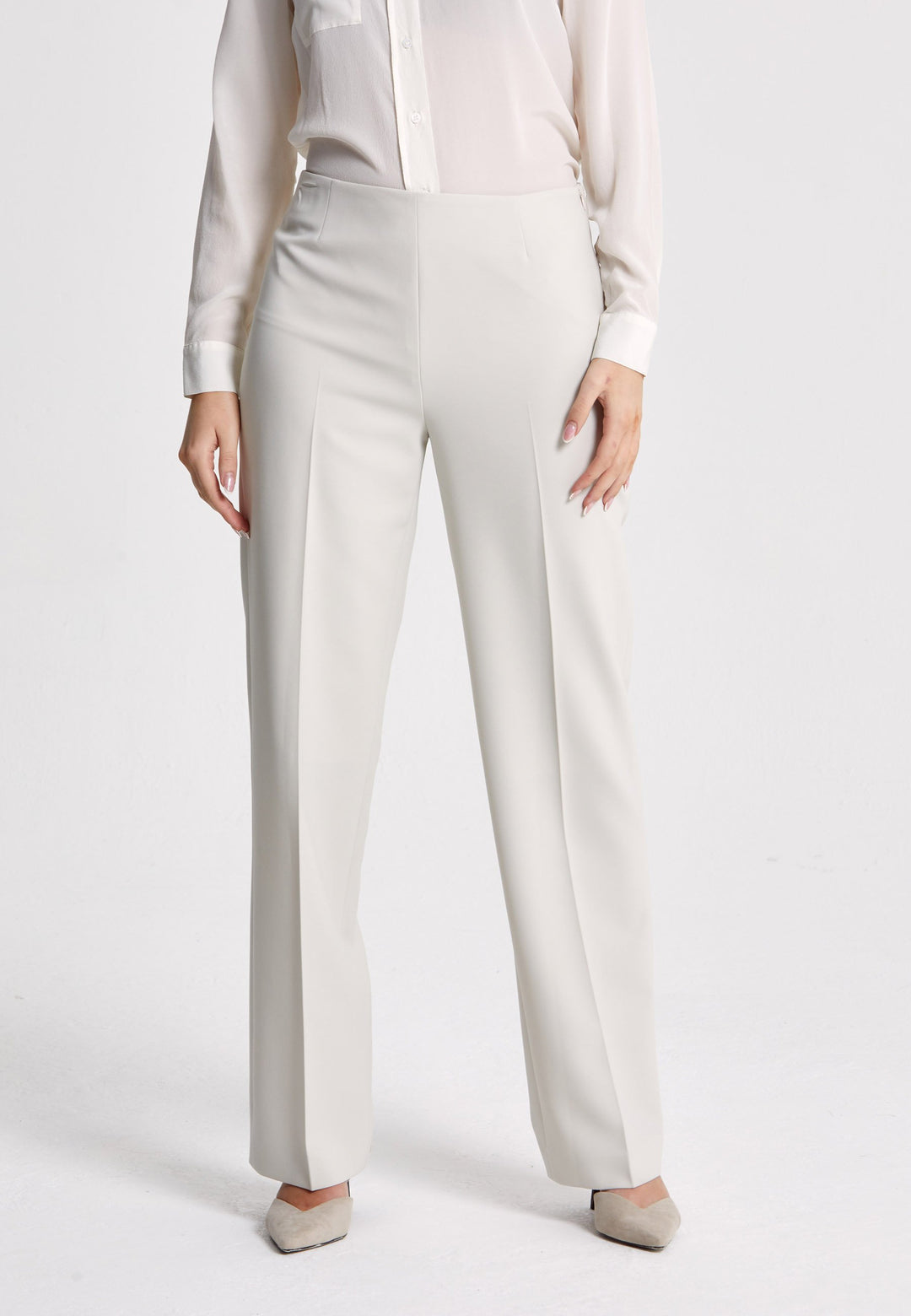 Investment-worthy, easy-fitting flat front pant. Relaxed straight leg crafted in a fluid tricotine. A wardrobe staple and HMcA classic. This fabric is made with a hint of elastane to ensure comfort and ease of movement. Shown here in a sophisticated neutral. Pair with a simple tee for workwear appeal or elevate your look with the coordinating blazer.