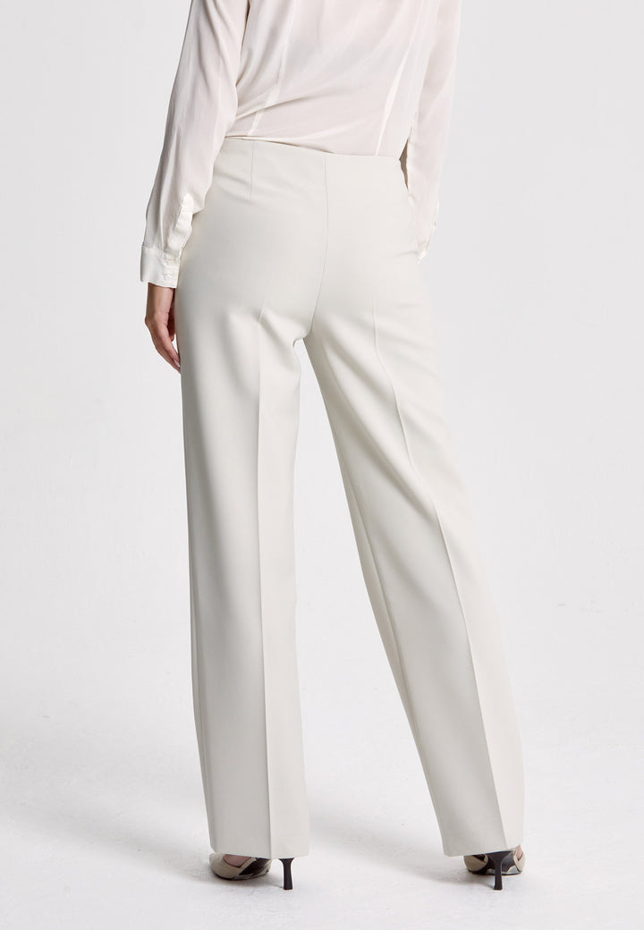 Investment-worthy, easy-fitting flat front pant. Relaxed straight leg crafted in a fluid tricotine. A wardrobe staple and HMcA classic. This fabric is made with a hint of elastane to ensure comfort and ease of movement. Shown here in a sophisticated neutral. Pair with a simple tee for workwear appeal or elevate your look with the coordinating blazer.