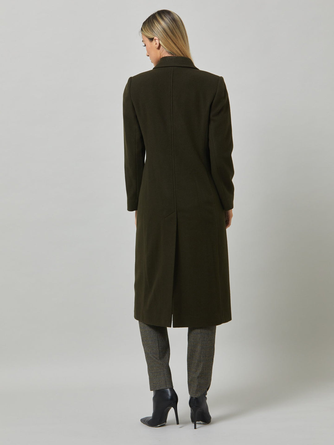 First impressions count, which is why great outerwear is a must. Invest in your wardrobe's hardest-working layer. Opt for the beryl coat. Note the double-breasted wrap front that creates a snug feel. The neat collar and revere is inspired by men's tailoring. It's cut from a wool blend in a dark olive melton. The style falls just below the knee.