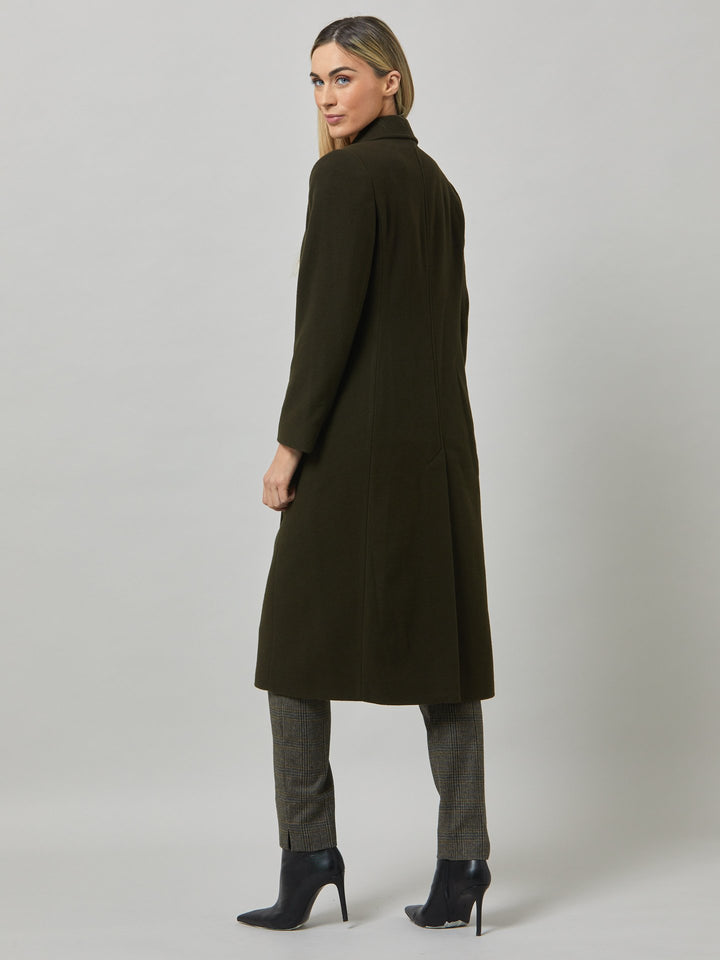 First impressions count, which is why great outerwear is a must. Invest in your wardrobe's hardest-working layer. Opt for the beryl coat. Note the double-breasted wrap front that creates a snug feel. The neat collar and revere is inspired by men's tailoring. It's cut from a wool blend in a dark olive melton. The style falls just below the knee.