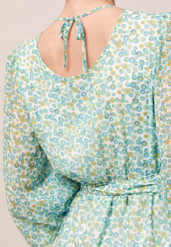 Opt for the Bev dress in a nuanced print to bring elegance to your everyday edit this season and beyond. Crafted in a sweeping midi-silhouette. The design is rooted in simplicity with a fit and softly flare skirt. Engineered Jewel neckline in this dress is accentuated with soft gathers. Waist is accentuated with a soft belt around the midriff for a customisable look that cinches the profile. The belt can be tied in the front or the back for added versatility. 
