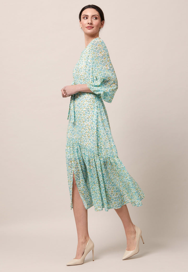 Opt for the Bev dress in a nuanced print to bring elegance to your everyday edit this season and beyond. Crafted in a sweeping midi-silhouette. The design is rooted in simplicity with a fit and softly flare skirt. Engineered Jewel neckline in this dress is accentuated with soft gathers. Waist is accentuated with a soft belt around the midriff for a customisable look that cinches the profile. The belt can be tied in the front or the back for added versatility. 