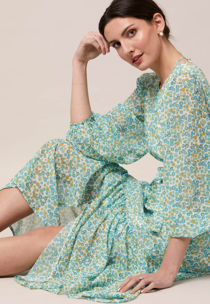 Opt for the Bev dress in a nuanced print to bring elegance to your everyday edit this season and beyond. Crafted in a sweeping midi-silhouette. The design is rooted in simplicity with a fit and softly flare skirt. Engineered Jewel neckline in this dress is accentuated with soft gathers. Waist is accentuated with a soft belt around the midriff for a customisable look that cinches the profile. The belt can be tied in the front or the back for added versatility. 