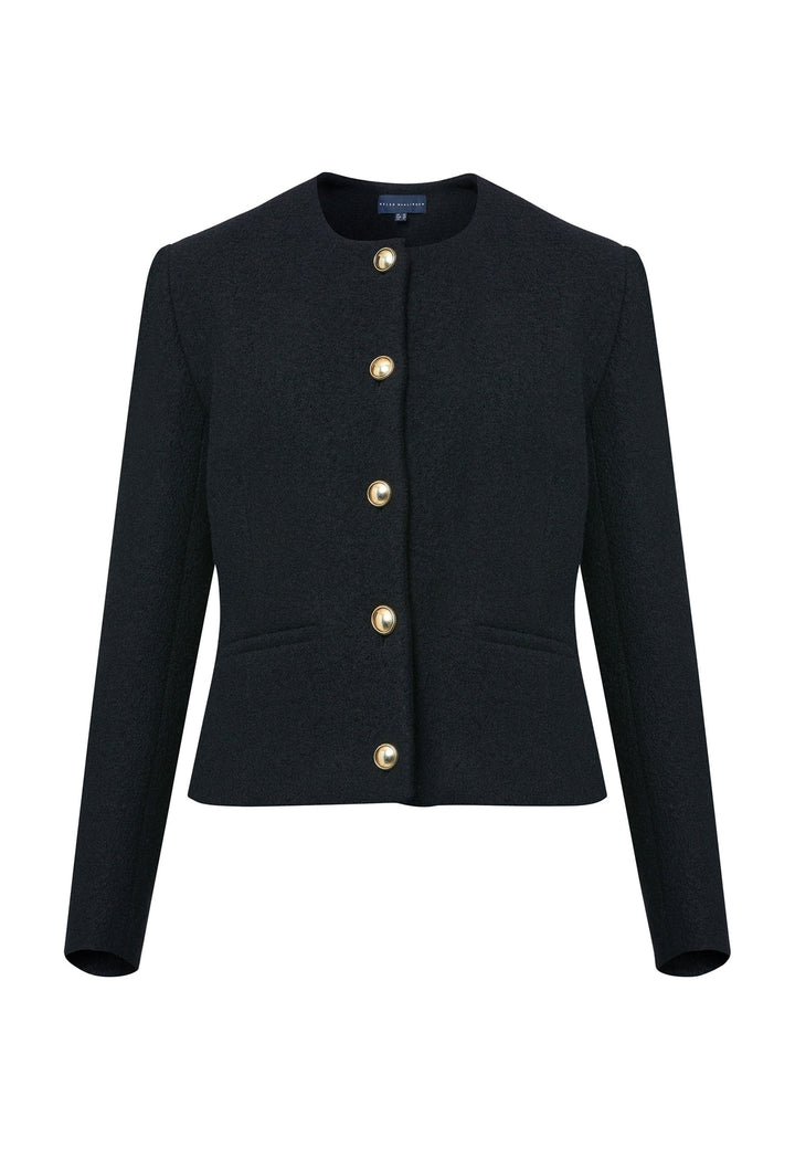 Introducing the Cassandra Black Jacket, a sleek and fitted piece crafted from a textured black boucle fabric. With its softly tailored silhouette, this jacket exudes modern elegance. The gold detail buttons add a touch of sophistication and elevate the overall aesthetic. Pair it effortlessly with the classic Jill pant for a timeless ensemble. The contemporary silhouette of the Cassandra Black Jacket is destined to become your go-to workwear icon for the season.