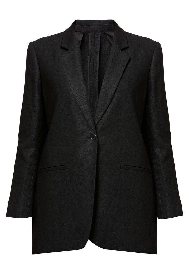 Cassie, the investment-worthy black linen blazer. The ultimate summer attire. Minimalist styling with a single button fastening. An oversized and slightly boxy silhouette. Wear it with a simple tee and the co-ordinating Vanessa pant with trainers for a chic and contemporary look