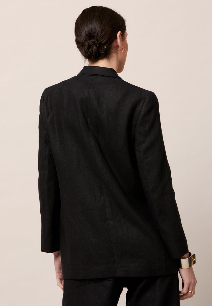 Cassie, the investment-worthy black linen blazer. The ultimate summer attire. Minimalist styling with a single button fastening. An oversized and slightly boxy silhouette. Wear it with a simple tee and the co-ordinating Vanessa pant with trainers for a chic and contemporary look