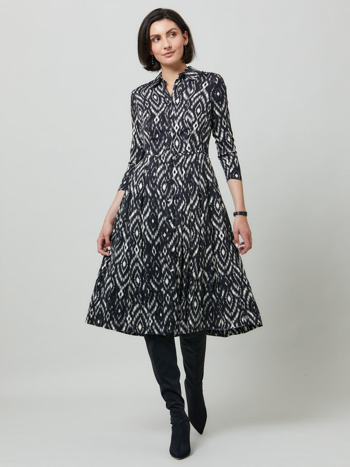 Sonia, a feminine take on the shirt dress. crafted in a fluid black and cream ikat printed viscose. A softly pleated skirt that falls to mid-calf. Wear to work, to the theatre, or out for cocktails with the girls. A simple yet feminine silhouette.