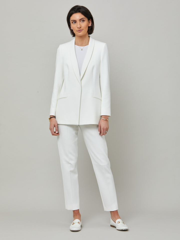 Meet Darcie, a minimalist wardrobe must-have. This piece will elevate your wardrobe. Style with matching slim leg or bootleg pants for chic and tailored look. Fabricated in our signature double crepe with a hint of stretch in iconic white. The perfect balance between classic & elegance.