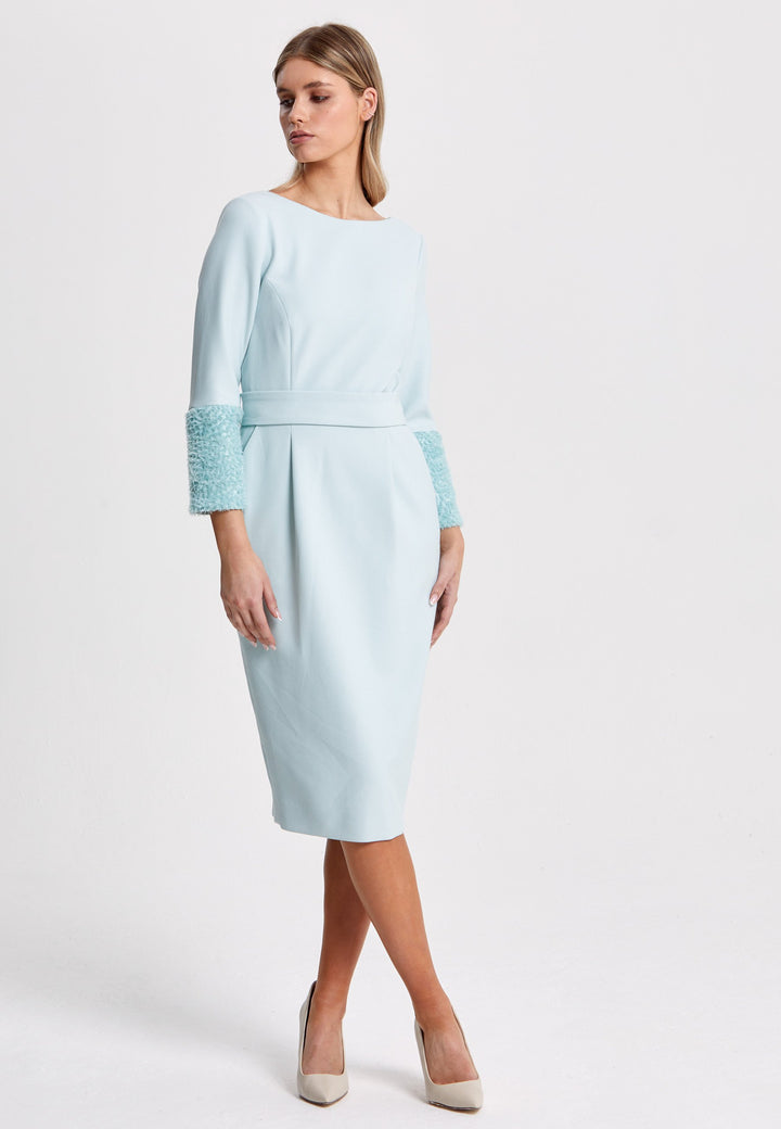 Dianna is the answer to any occasion invite. An elegant dress with a sculptured petal detail cuff. An expertly tailored form-flattering silhouette with pockets, detachable belt & pencil skirt which falls to mid-calf. Crafted from sustainably sourced fibers with a hint of stretch to ensure comfort & ease of movement. Heighten the drama of this piece with your favourite accessories and heels.