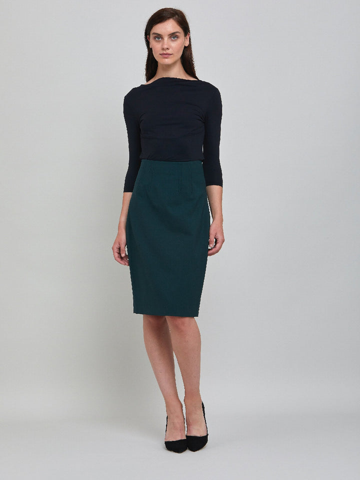 Classic officewear short pencil skirt in solid emerald wool with a hint of stretch for added comfort.
