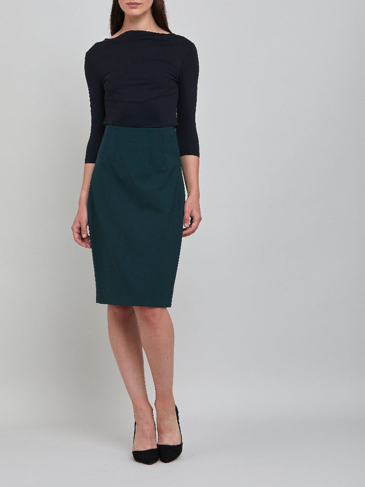 Classic officewear short pencil skirt in solid emerald wool with a hint of stretch for added comfort.