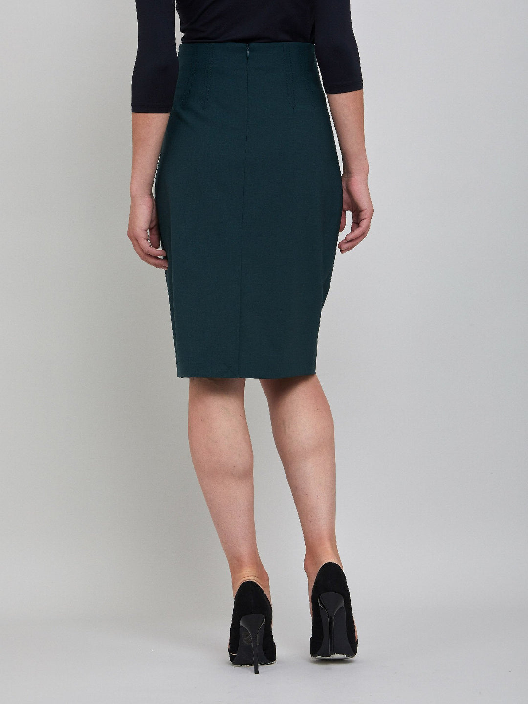 Classic officewear short pencil skirt in solid emerald wool with a hint of stretch for added comfort.