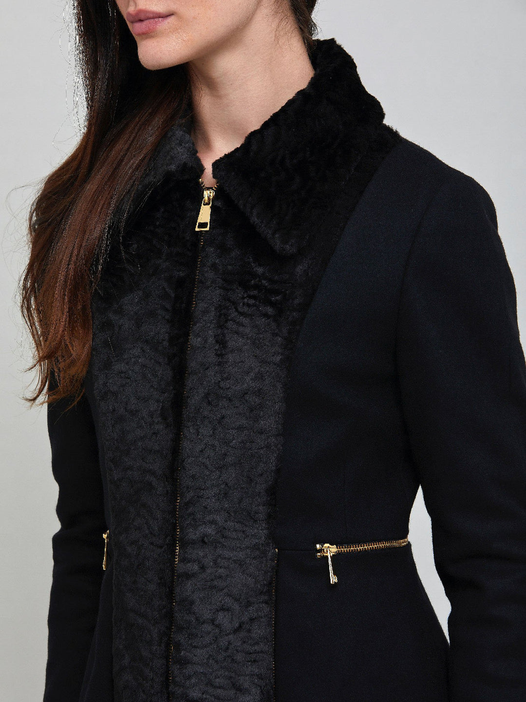 Elizabeth, true timeless sophistication in a black coat. An over-the-knee length coat made of cashmere blend, embellished with faux fur front panels and gold metal zippers, you will wear day after day.  Team with Belle or jill pant or for minimal style.