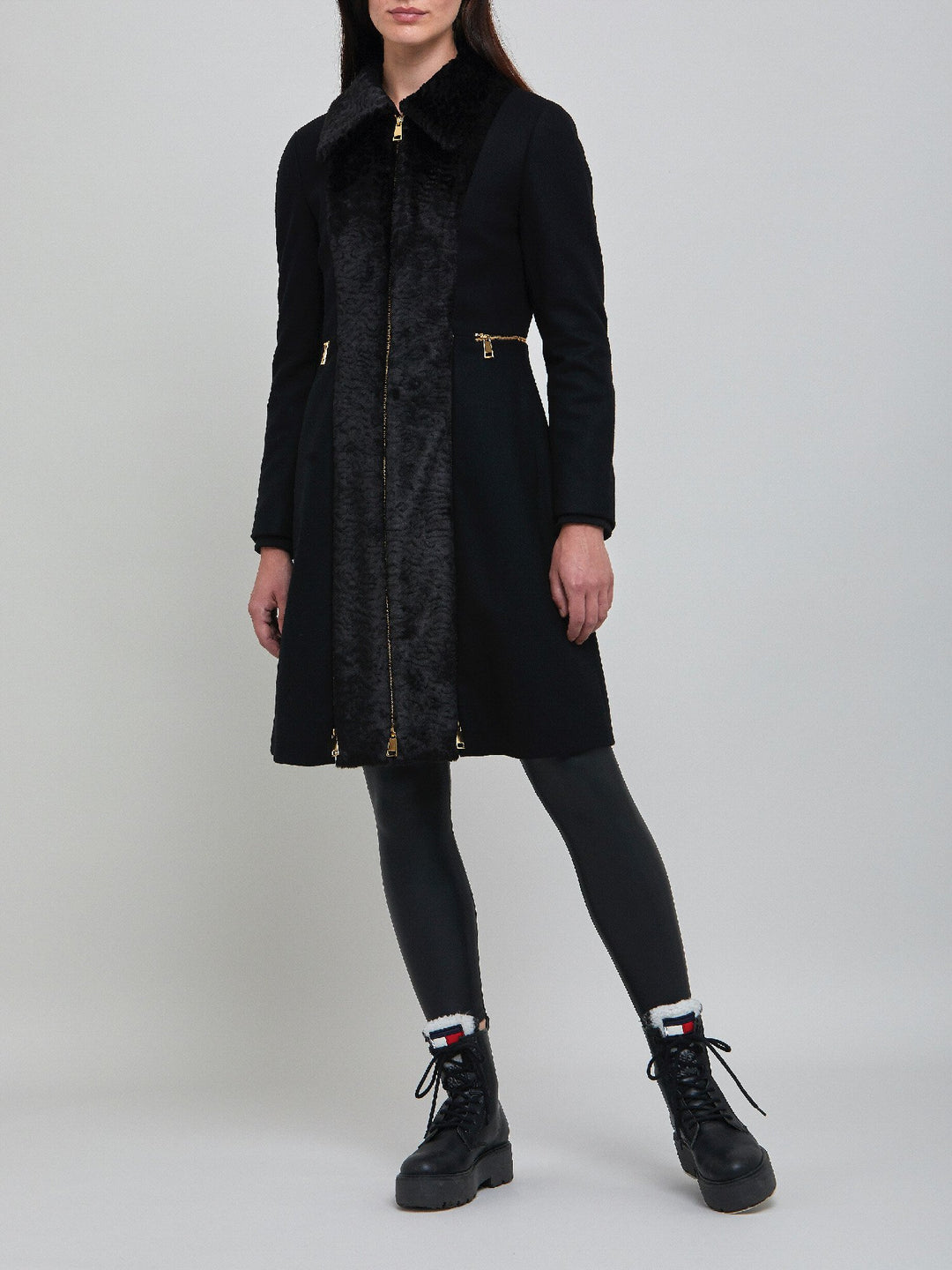 Elizabeth, true timeless sophistication in a black coat. An over-the-knee length coat made of cashmere blend, embellished with faux fur front panels and gold metal zippers, you will wear day after day.  Team with Belle or jill pant or for minimal style.