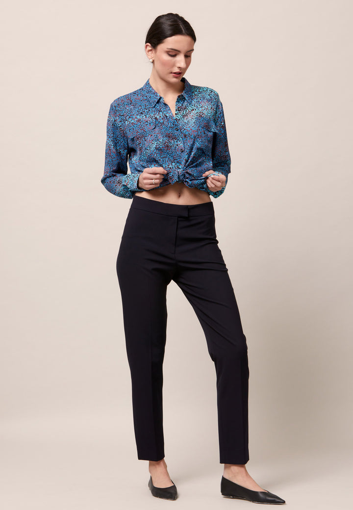Elevate your day edit with the Ella utility shirt. It's engineered from a lightweight printed viscose crepe. This must-have shirt features patch pockets, back yoke & center back box pleat. An easy-fit shirt to elevate your everyday. Tuck into the Jill trousers then add heels and a blazer to create a refined daytime look that easily transitions into evening plans.