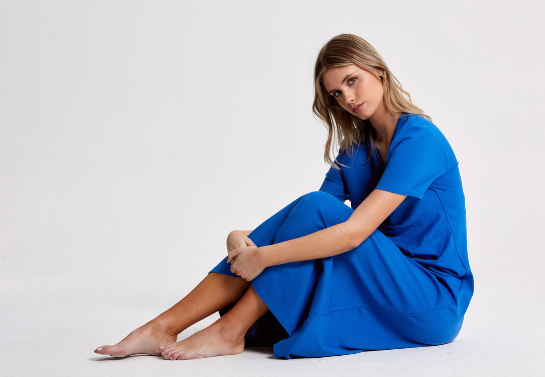 Finnley, Easy fitting jersey dress for everday. Ruched front adds flattering finish to this figure skimming silhouette. Features a Slightly flared Midi-length skirt, V-neckline and capped t-shirt sleeves. Cut here from a striking Cobalt blue.