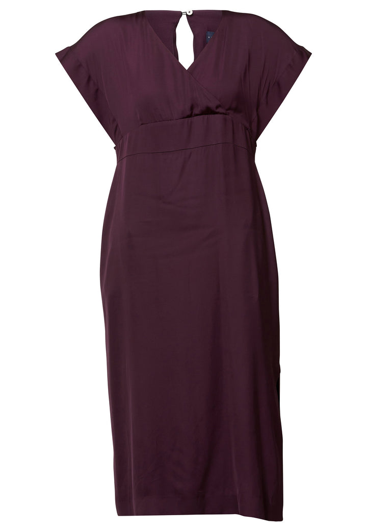 Evening edits get upgraded with the Fleur dress. Crafted in a luxurious Aubergine satin viscose. An easy-fitting silhouette with a v-neckline. Skirt falls to the mid-calf and side seam slit adds a sense of allure. Features handy Side seam pockets. Engineered with an elegant key-hole back neck detail. Simply add heels and a clutch for a look that turns heads at any event. Classic Occasionwear, modernized.
