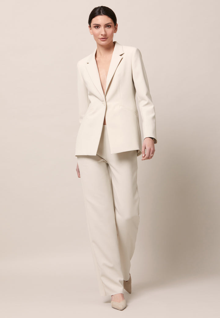 Willow, the investment-worthy tailored blazer. Engineered with a classic collar & revere and handy flap pockets. Cut to a semi fitted silhouette with a single button closure. Shown here in a sophisticated ivory tone. Pair with a simple tee for workwear appeal or elevate the look with the co-ordinating jill pant.