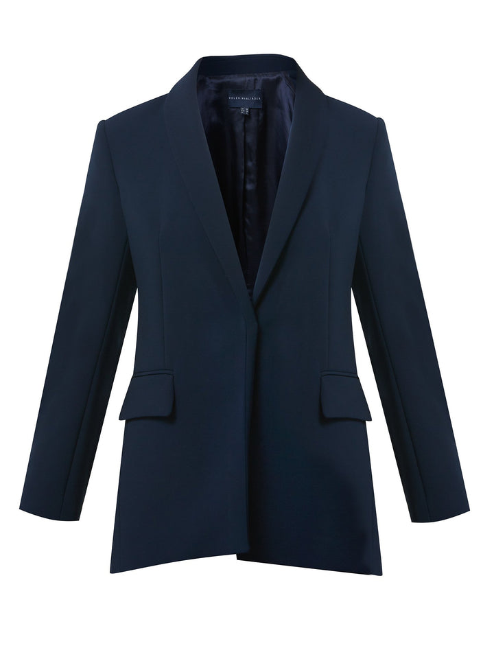 modern take on the classic blazer. An easy fit French Navy Jacket with a sporty stripe trim on the sleeve & cross back