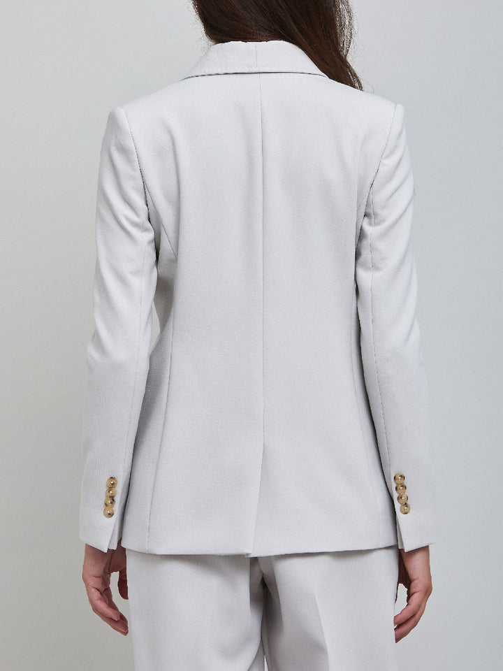 Jenny the investment-worthy blazer, the ultimate office attire. Minimalist styling with no trim and button. A real classic. Wear it with matching pants for the perfect office look.