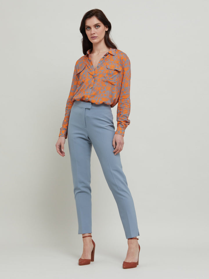 Jill, an investment worthy, neat narrow-leg trouser crafted in our signature double crepe with a hint of stretch. A wardrobe staple & HMcA classic. This season in a sophisticated smoky blue. Designed in Ireland by Helen McAlinden. Made in Europe. Free shipping to the EU & UK.