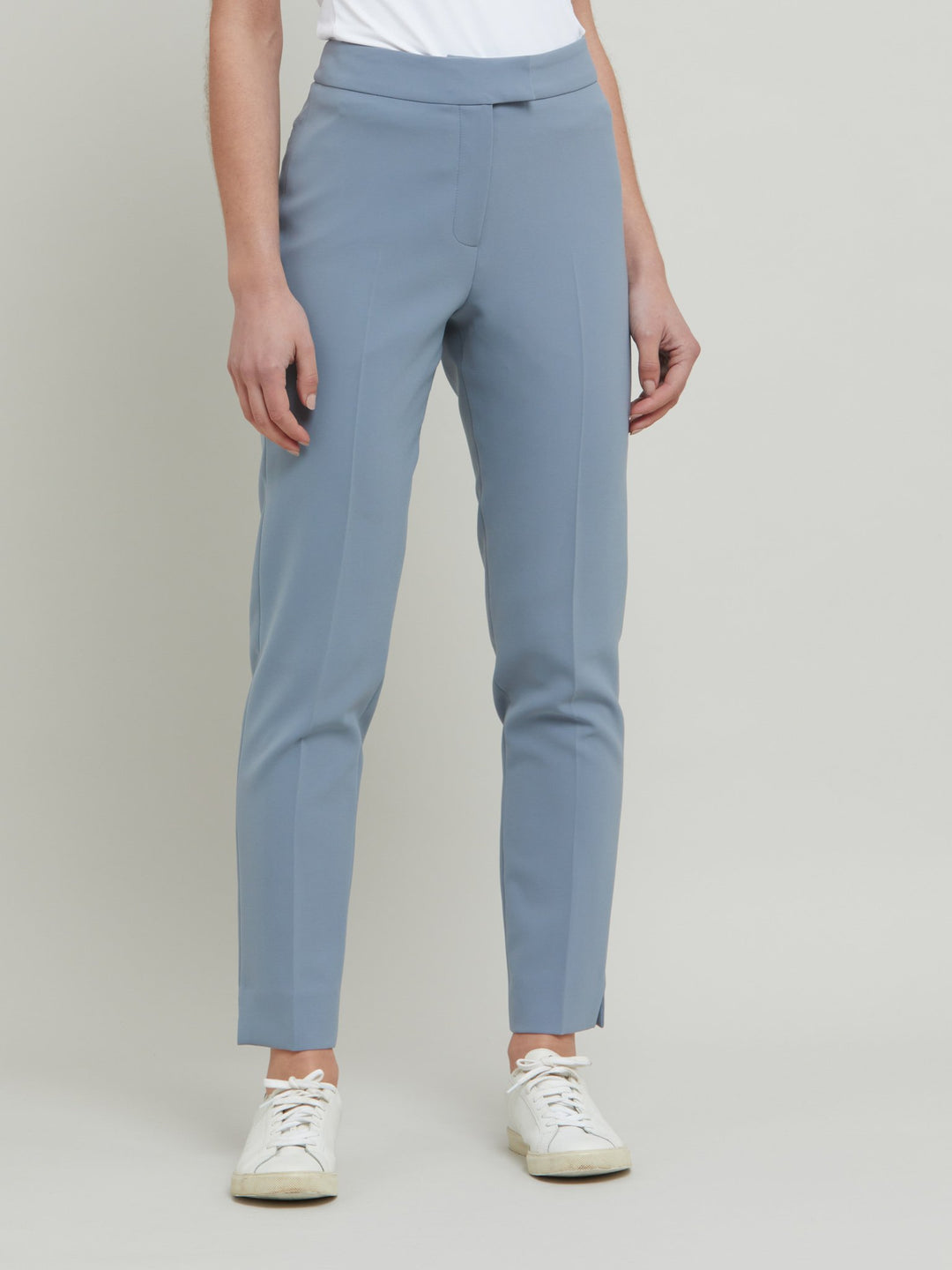 Jill, an investment worthy, neat narrow-leg trouser crafted in our signature double crepe with a hint of stretch. A wardrobe staple & HMcA classic. This season in a sophisticated smoky blue. Designed in Ireland by Helen McAlinden. Made in Europe. Free shipping to the EU & UK.