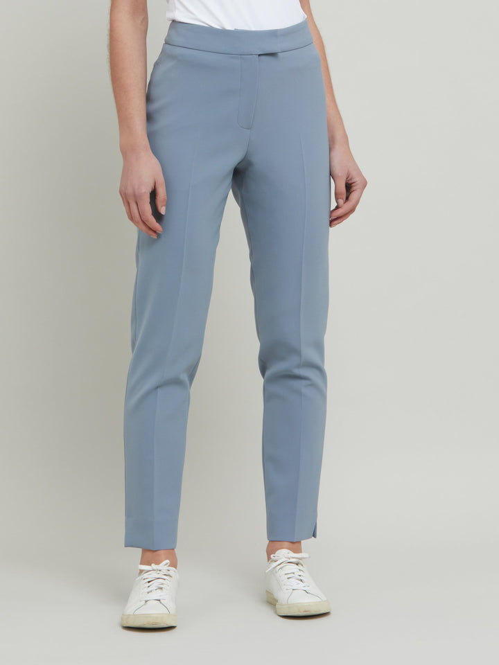 Jill, an investment worthy, neat narrow-leg trouser crafted in our signature double crepe with a hint of stretch. A wardrobe staple & HMcA classic. This season in a sophisticated smoky blue. Designed in Ireland by Helen McAlinden. Made in Europe. Free shipping to the EU & UK.