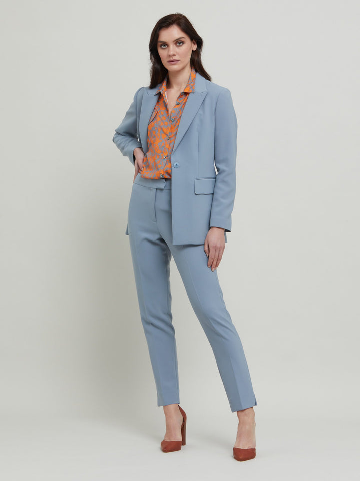 Jill, an investment worthy, neat narrow-leg trouser crafted in our signature double crepe with a hint of stretch. A wardrobe staple & HMcA classic. This season in a sophisticated smoky blue. Designed in Ireland by Helen McAlinden. Made in Europe. Free shipping to the EU & UK.