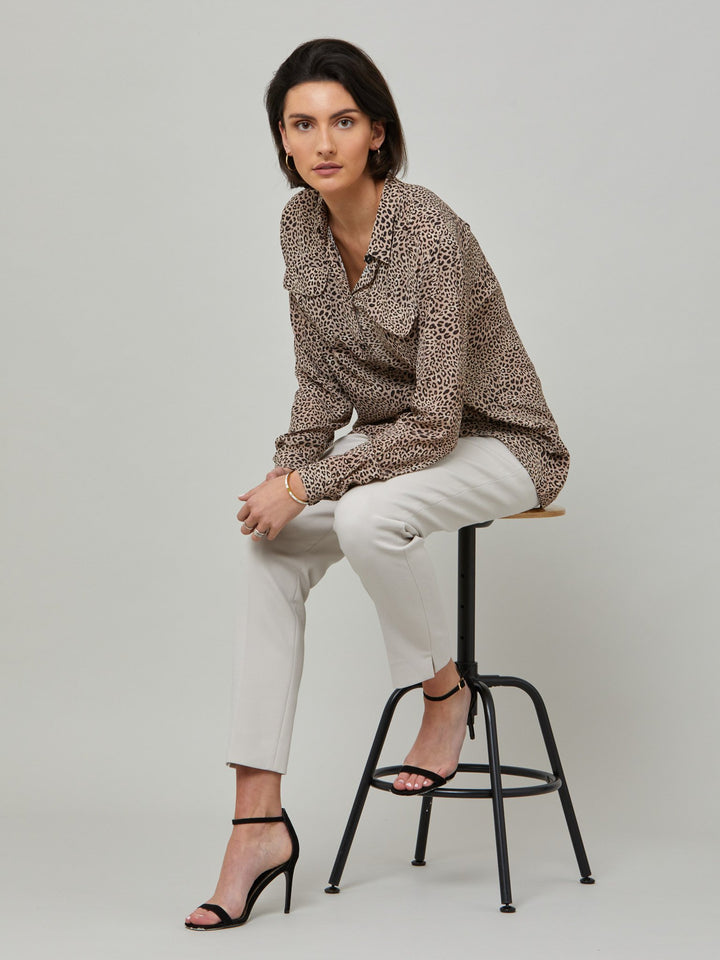 full body picture of model wearing latte jill. Investment-worthy, neat narrow-leg trouser with a hint of stretch. A wardrobe staple and HMcA classic, here in a sophisticated latte shade