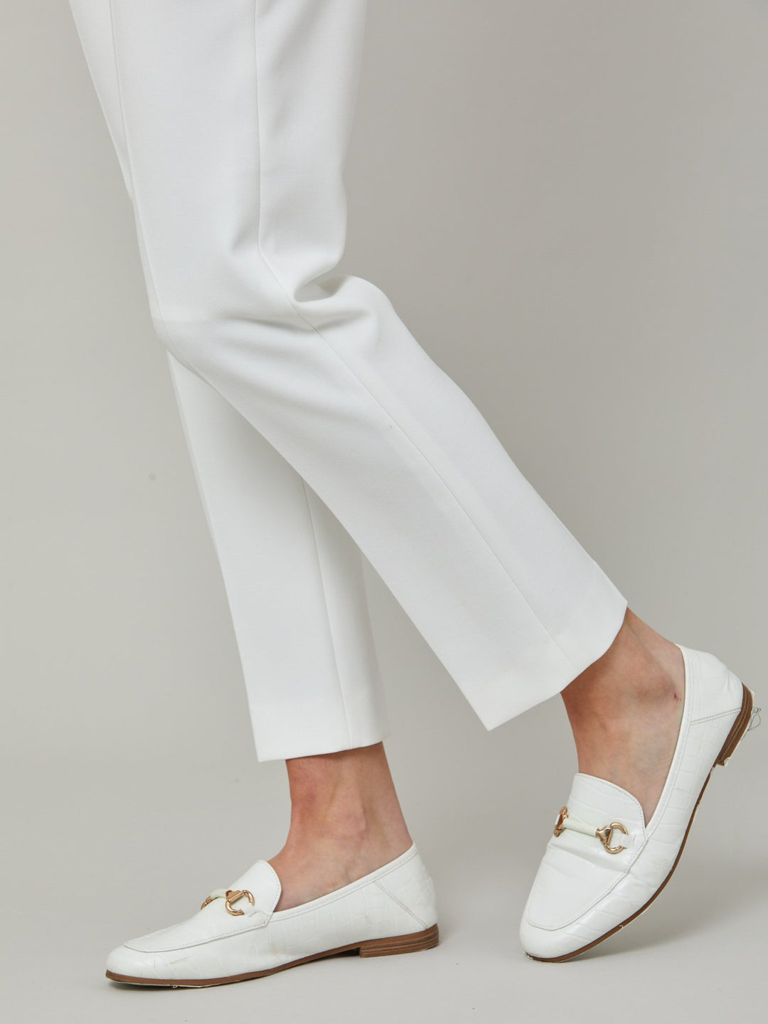 jill  Investment-worthy, neat narrow-leg trouser with a hint of stretch. A wardrobe staple and HMcA classic, here in optical white.