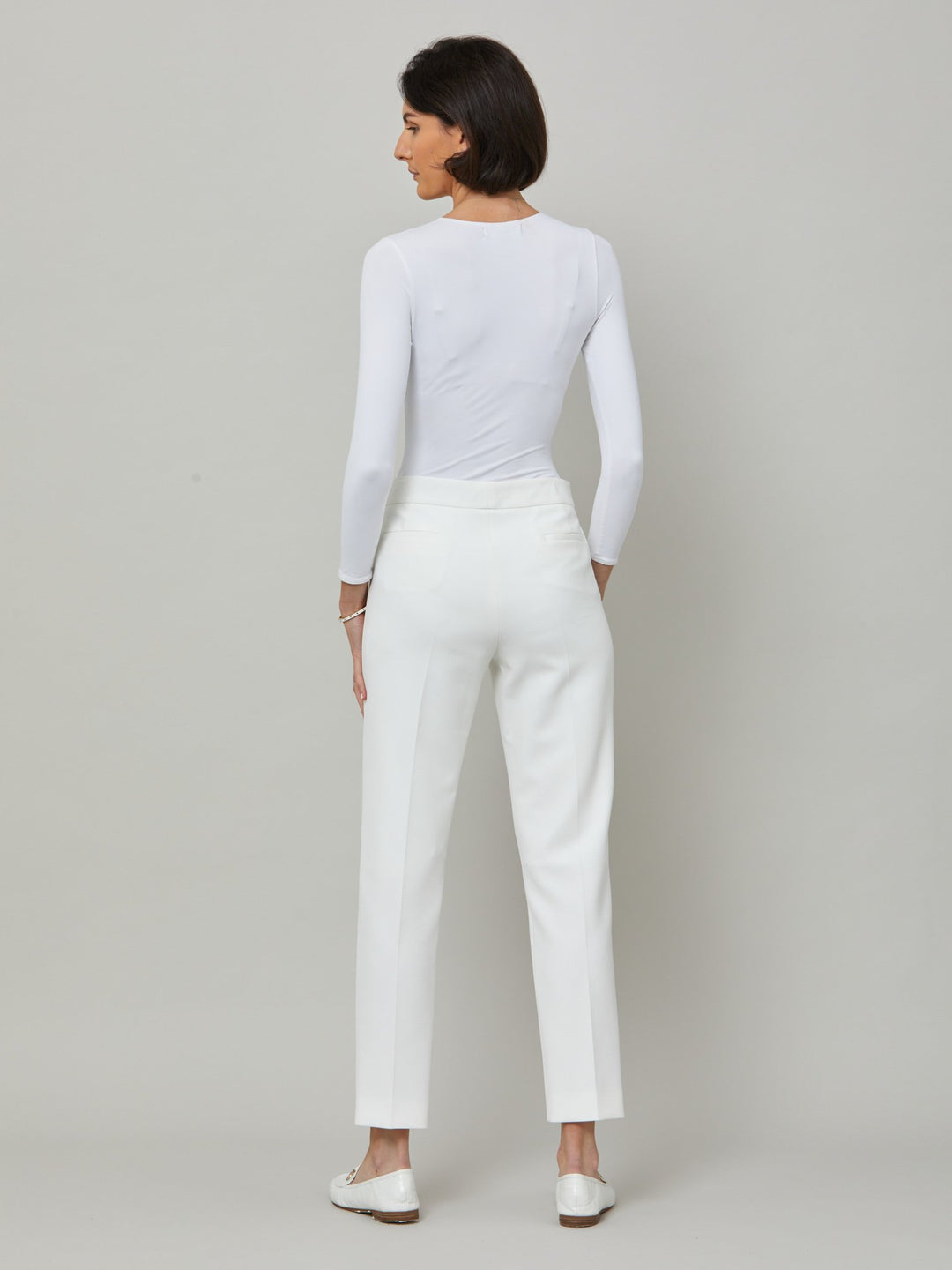 back picture of white jiill,  Investment-worthy, neat narrow-leg trouser with a hint of stretch. A wardrobe staple and HMcA classic, here in optical white.