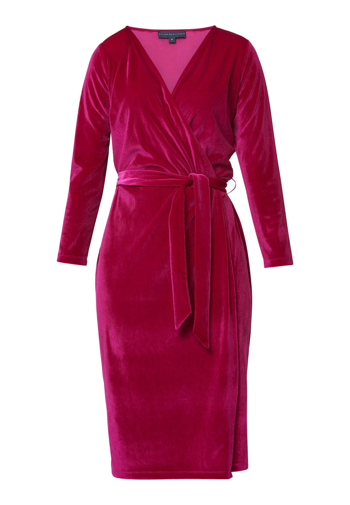 Introducing the Jordan Fuchsia Velvet Dress, a must-have addition to your winter wardrobe. This versatile dress combines luxurious stretch velvet a flattering v-neckline, offering a perfect blend of warmth, sophistication, and style. The faux wrap design creates a feminine silhouette that transitions seamlessly from desk to dinner, while the detachable belt allows you to customize your look to suit any occasion. 