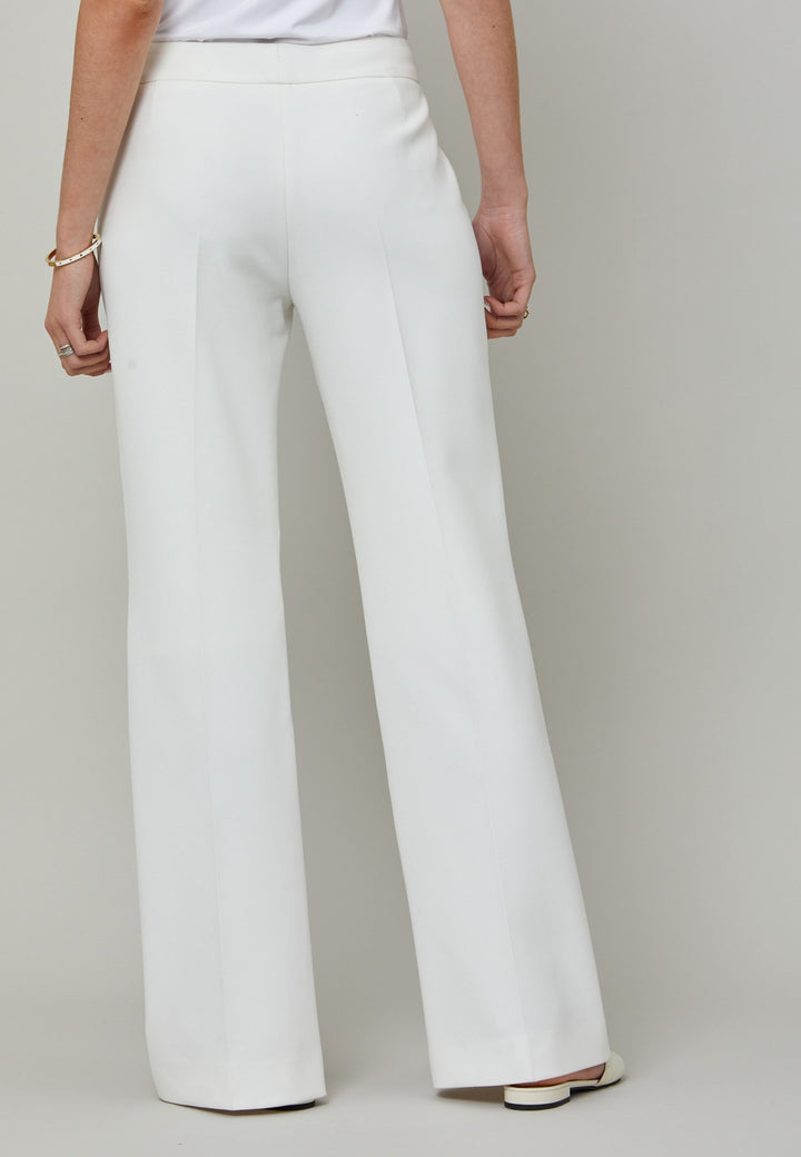 Kelly, an iconic white flare pant. Crafted in sustainable double crepe with a hint of stretch. Revisit the 70's for this season’s game-changing look. Flares are sophisticated, comfortable & leg-lengthening. Guaranteed to flatter the form & never far from fashion’s front line