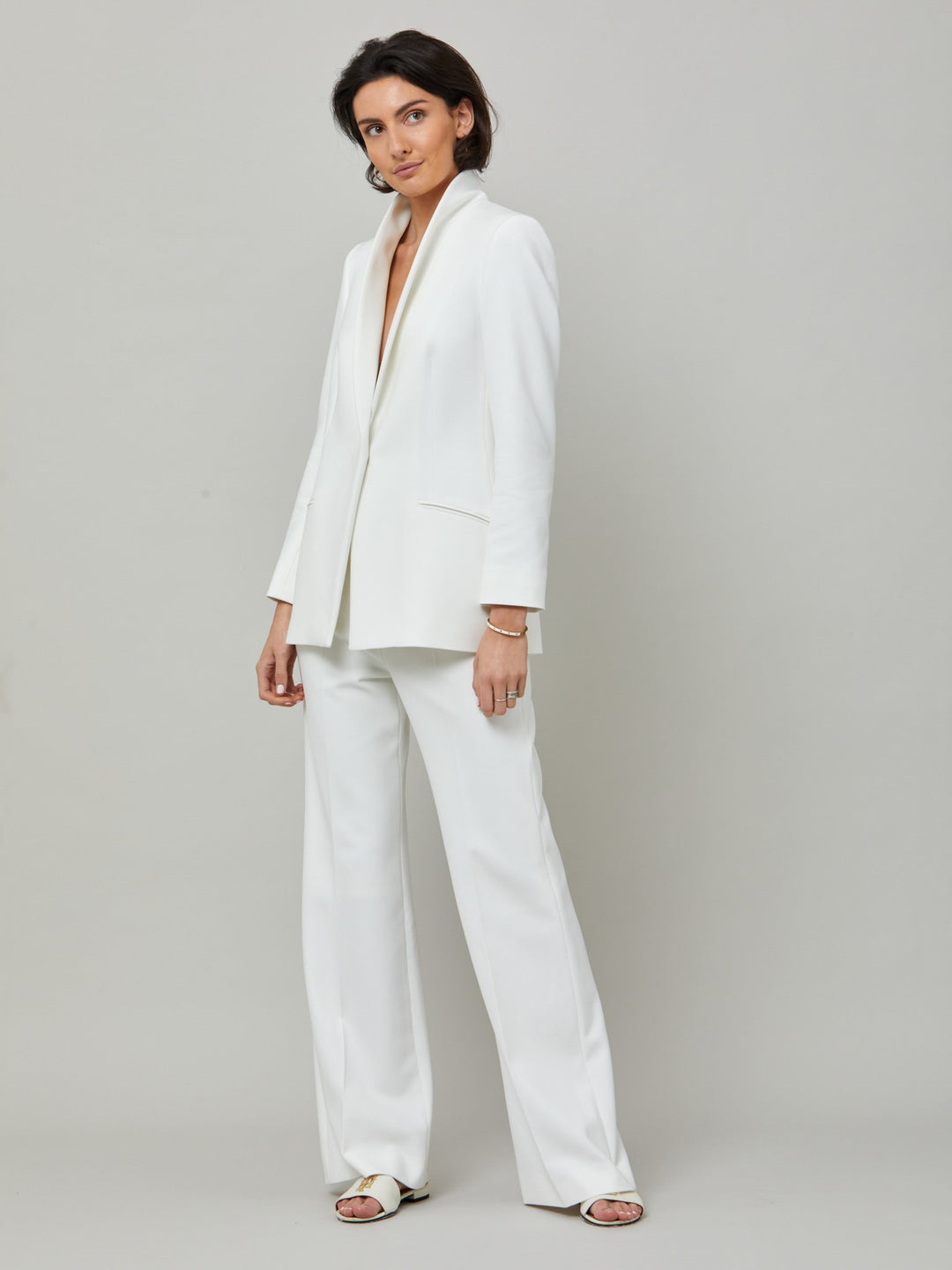 Kelly, an iconic white flare pant. Crafted in sustainable double crepe with a hint of stretch. Revisit the 70's for this season’s game-changing look. Flares are sophisticated, comfortable & leg-lengthening. Guaranteed to flatter the form & never far from fashion’s front line.