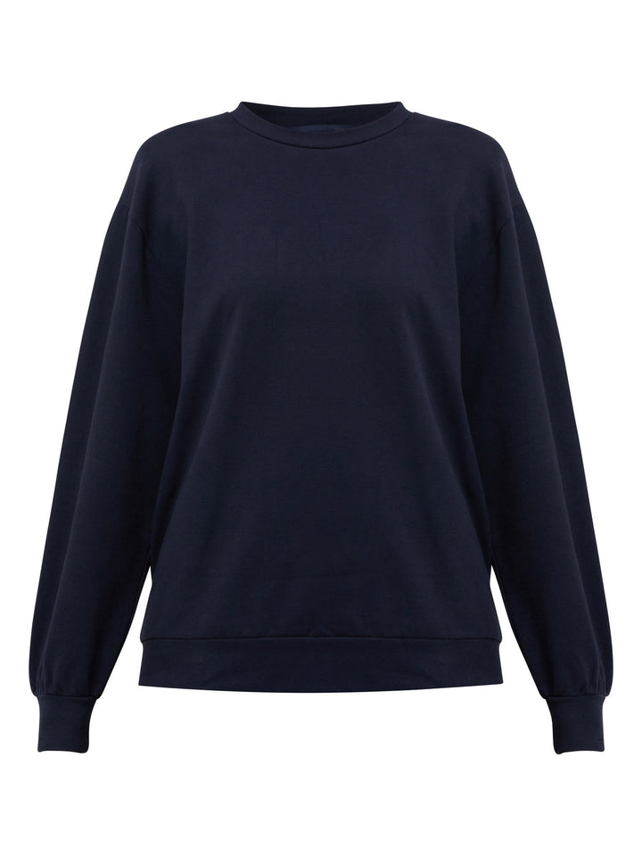 The Khloe indigo sweatshirt. A Jewel neck oversized jumper with full-length sleeves. Khloe takes you from everyday living to your yoga sessions. Crafted from a premium organic cotton jersey. Designed in Ireland by Helen McAlinden. Made in Europe. Free shipping to the EU & UK.