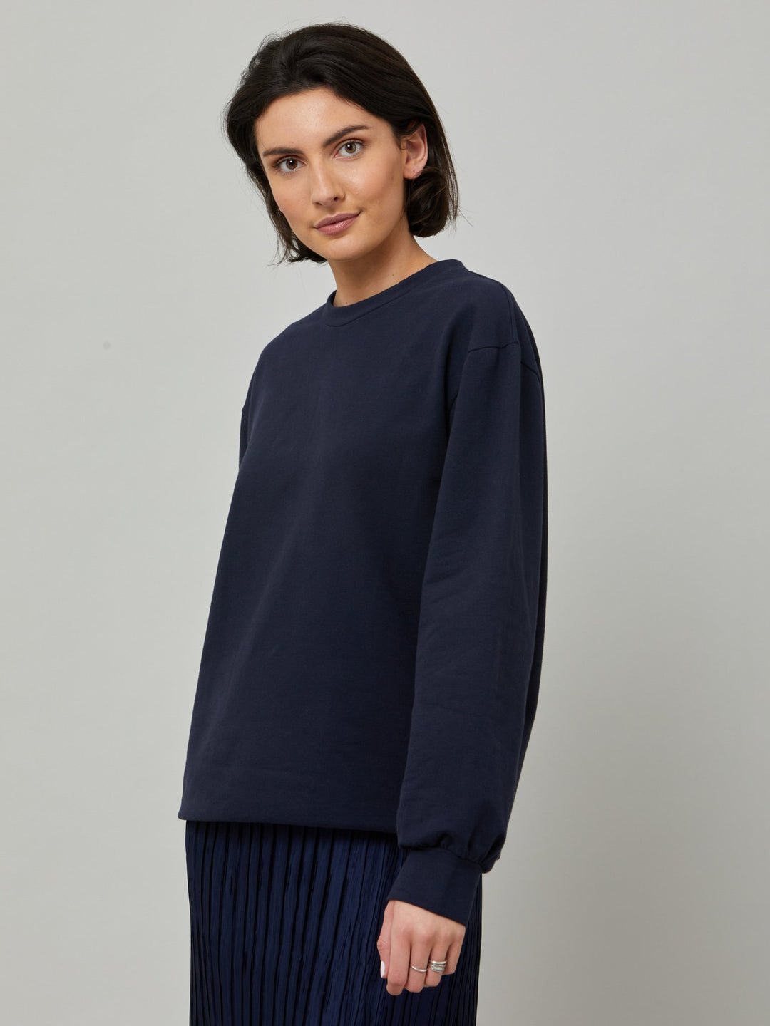 The Khloe indigo sweatshirt. A Jewel neck oversized jumper with full-length sleeves. Khloe takes you from everyday living to your yoga sessions. Crafted from a premium organic cotton jersey. Designed in Ireland by Helen McAlinden. Made in Europe. Free shipping to the EU & UK.