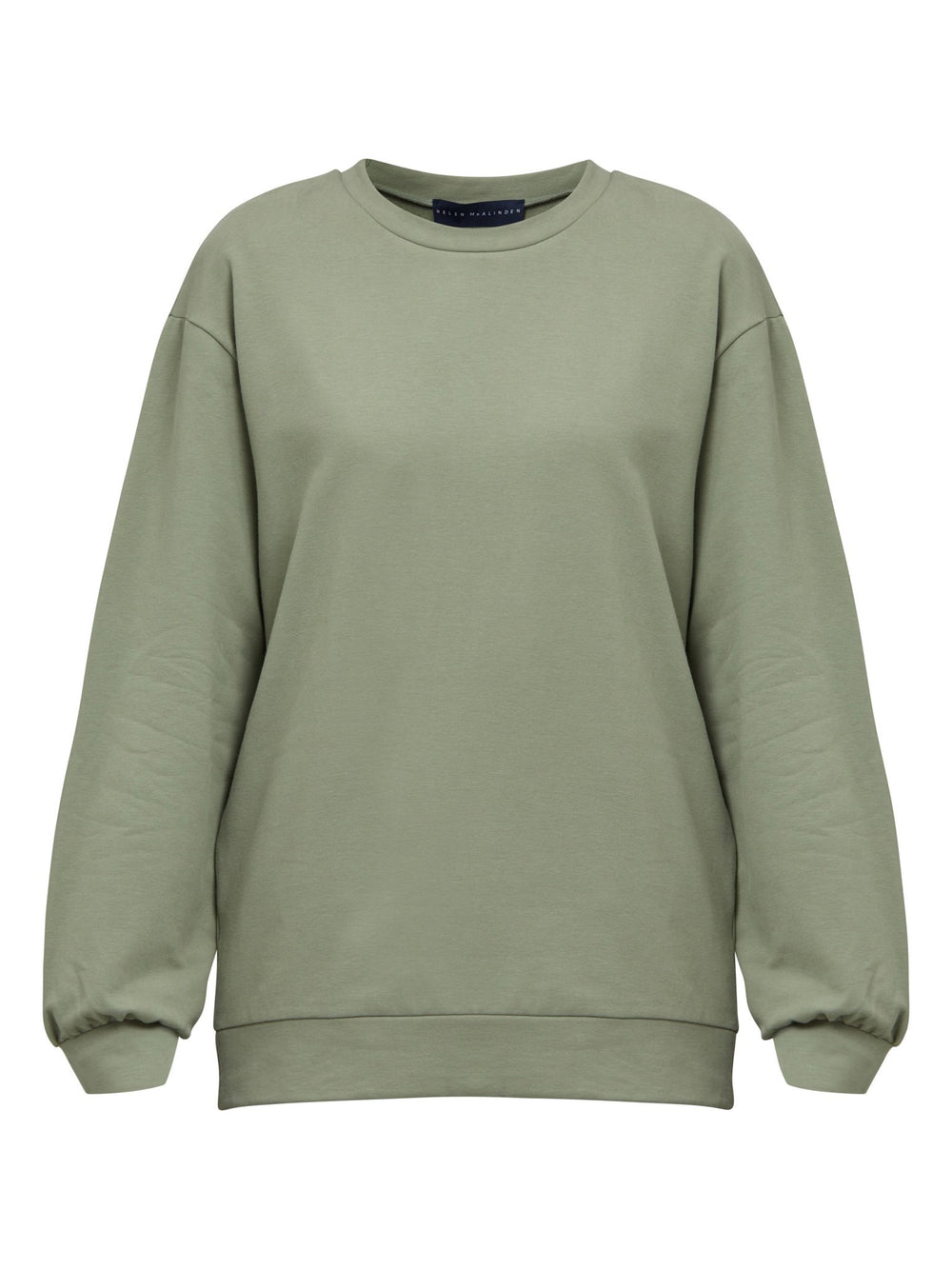 The Khloe tea-green sweatshirt. A Jewel neck oversized jumper with full-length sleeves. Khloe takes you from everyday living to your yoga sessions. Crafted from a premium organic cotton jersey. Designed in Ireland by Helen McAlinden. Made in Europe. Free shipping to the EU & UK.